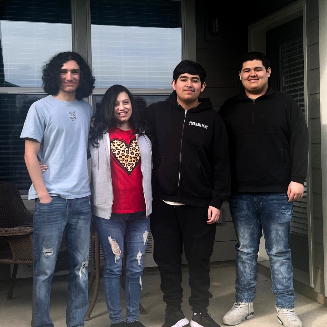 Pictured in photo from left to right: Isaiah, Roberta, Donovan, and Jayden